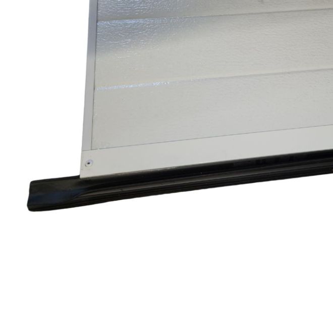 Joint pour porte sectionnelle à double lèvre