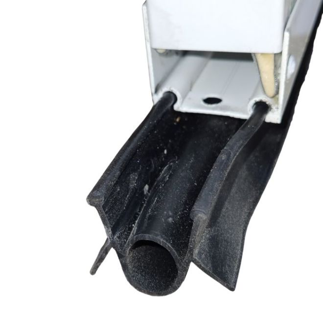 Joint pour porte sectionnelle à double lèvre